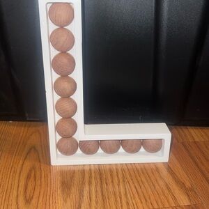 White and Brown Decorative Letter L